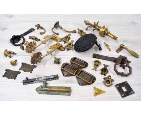 Selection old brass door furniture, hooks, sconces etc; also a foliate trivet 