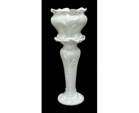 Art Nouveau style pottery jardinière, mint green ground with white stylised flowers and foliage upon matching pillar/plinth j