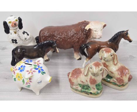 Large Melba Ware pottery figure of a bull, 10" high; together with a Melba Ware pottery figure of a horse, another pottery ho