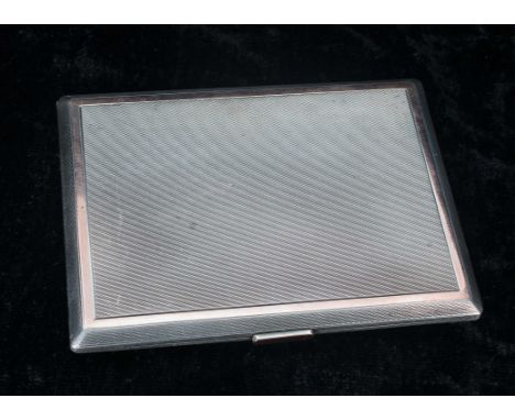 Silver cigarette case, with engine turned decoration and gilt interior, named inscription to the interior, maker Gladwin Ltd.