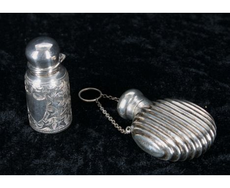 Victorian miniature silver scent bottle,&nbsp;with engraved decorated ground around a vacant shield cartouche, the hinged cov