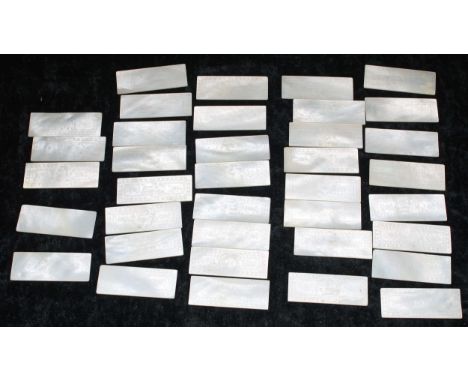 Collection of thirty seven Chinese mother of pearl gaming counters, rectangular, each with central figural scene within flora