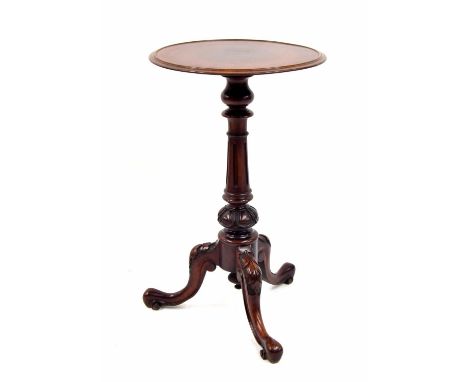 Victorian circular mahogany occasional wine table, the moulded top upon a turned fluted column upon an acanthus carved cabrio