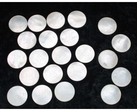 Collection of Chinese mother of pearl gaming counters, circular, seventeen with central griffin within foliate borders, five 