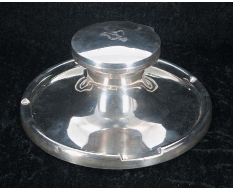 Large Capstan silver circular&nbsp; inkwell, the hinged cover bearing 'Pro Partria Et Camino' crest, enclosing a clear glass 