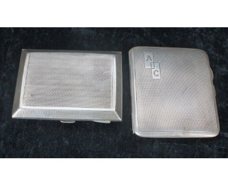 Harman Brothers engine turned silver cigarette case, initialled 'AC', Birmingham 1932, 2.75" x 3.5"; together with another si