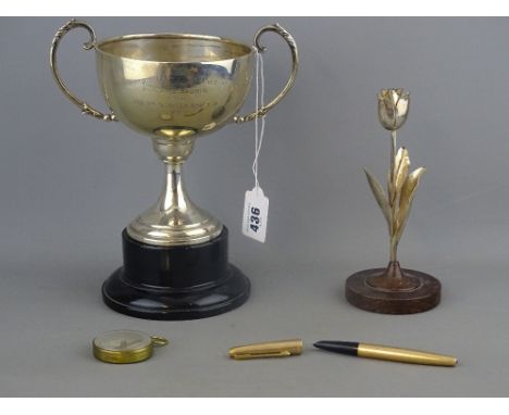 Silver presentation trophy cup on stand, a Continental rose on stand, a gold plated Parker pen and a pocket compass