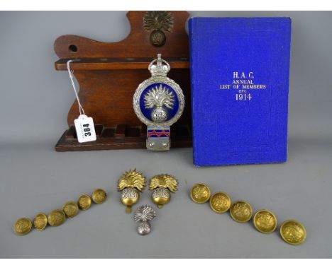 Collection of Honorable Artillery Company memorabilia including a '1914 List of Members' book, a motor car badge stamped 'JRG