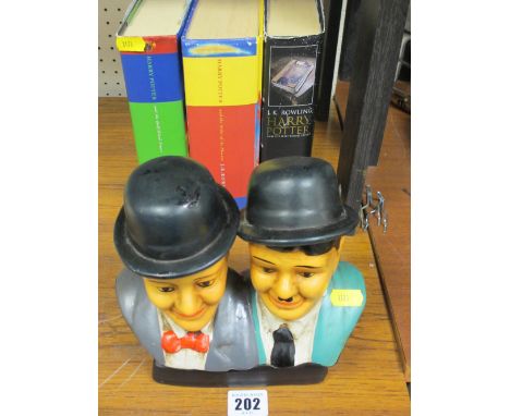 Novelty Laurel &amp; Hardy figures and a collection of Harry Potter books