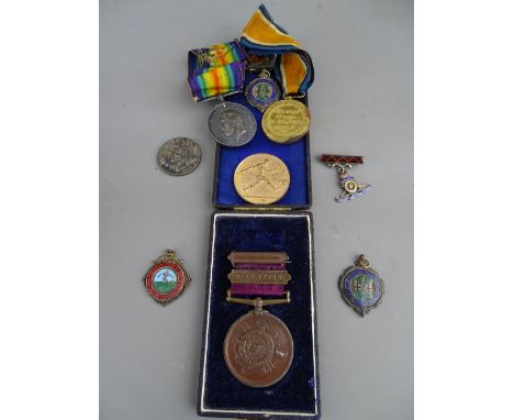 World War I medal pair awarded to 220767 GNR R E Price RA, a National Fire Brigade Union medallion with five year clasp, five