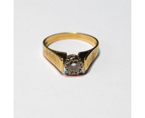 Diamond solitaire ring with brilliant, approximately .3ct, in textured 18ct gold, 3.4g.