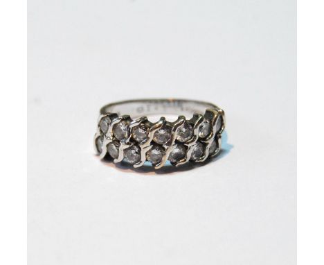 Diamond half eternity style ring with two rows each of seven brilliants in wavy setting, 18ct gold, by Boodle &amp; Dunthorne