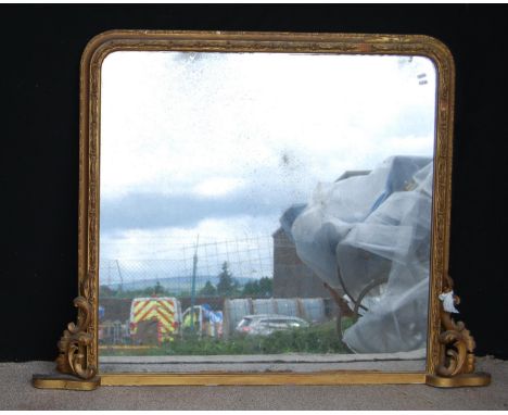 Victorian gilt overmantel mirror, the moulded floral frame flanked by floral brackets, 142cm wide and 106cm high.CONDITION RE