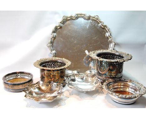 Pair of EP magnum holders, two decanter stands, two pierced dishes and a circular tray. 