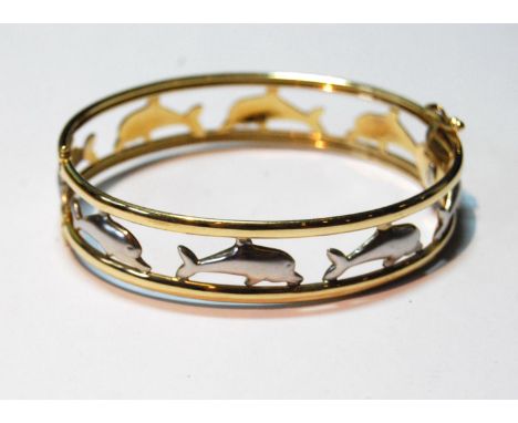 Coloured gold openwork hinged bangle with leaping dolphins, '585', 20g. 