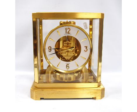 Jaeger-LeCoultre Atmos clock with white chapter ring and Arabic numerals, 21cm wide and 23.5cm high.CONDITION REPORT: There i