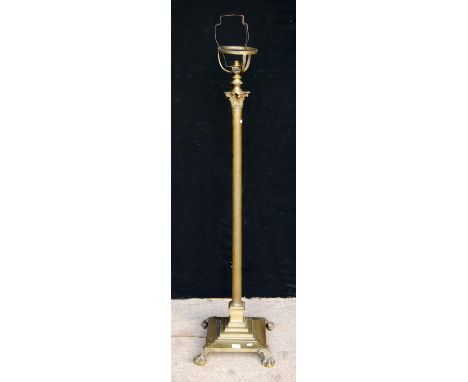 Brass Corinthian column standard lamp with reeded column, square plinth base and claw and ball feet, 134cm high. 