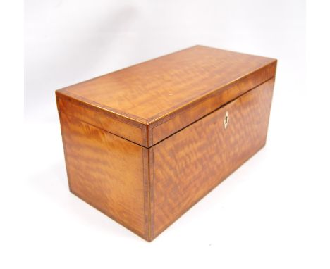 19th century satinwood tea caddy of rectangular form with crossbanding, enclosing a fitted interior, 30.5cm wide, 15cm high a