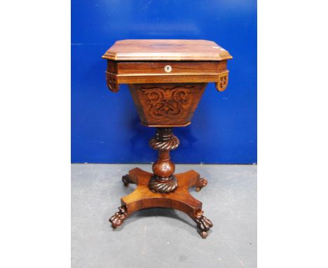 Victorian rosewood work table, the moulded rectangular hinged top with canted corners enclosing fitted interior over closed f