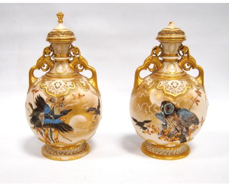 Near pair of late 18th century Royal Worcester ivory ground flasks with stoppers, each decorated with gilt foliate handles, d