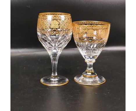 Two De Lamerie Fine Bone China heavily gilded Non Matching Wine Glasses with Arabic Motif, specially made high end quality it