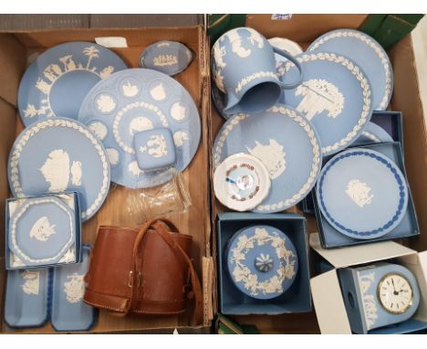 A collection of Wedgwood jasperware items to include decorative wall plates, boxed mantle clock, jug, together with a cased p