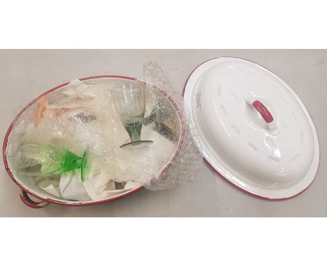 Vintage red and white enamel Roasting dish together with multicoloured sherry glasses (inside dish) 