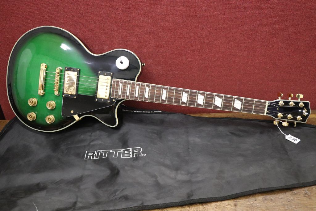 Guitar Axl Les Paul style electric guitar in green, new and unused