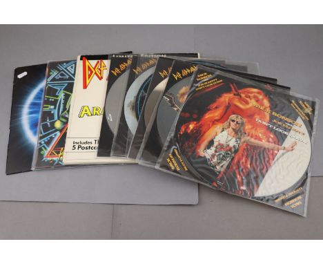 Vinyl - Def Leppard, 2 LP's, 1 12", and 5 picture discs. LP's are Hysteria (HYSLP1) &amp; Adrenalize (510978-1), Ltd Edn Arma