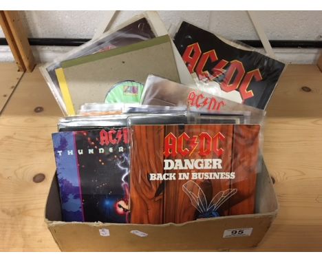 Vinyl - 40 AC/DC 45s mainly in company sleeves plus 2 x The Rolling Stones Saint of Me picture discs