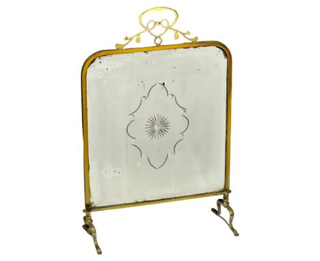 An Early 20th Century Art Nouveau brass mirror firescreen. Circa 1900-1910. 47x20x72cm 