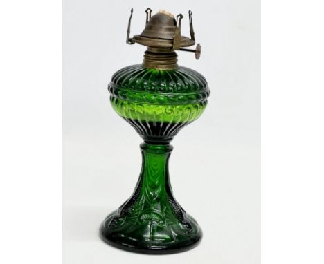 A Late 19th Century Bristol Green glass oil lamp. Circa 1890-1900. 25cm 