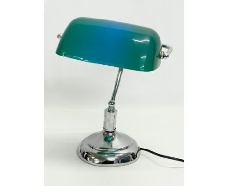 A desk lamp with plastic shade. 28x36cm 