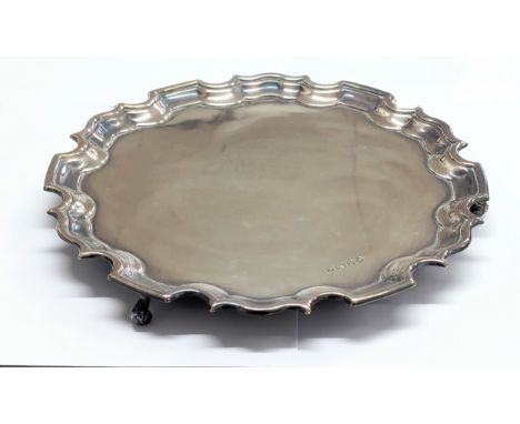 A silver salver by Carr's of Sheffield Ltd, raised on 3 Cabriole feet. Sheffield, 1997. Approx 600g. 25x2.5cm 