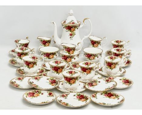 A 34 piece Royal Albert ‘Old Country Roses’ coffee service. Coffee pot, 9 coffee cups 9.5x7.5x9.5cm. 18 saucers 12cm. 3 milk 