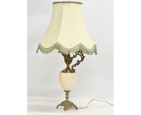 A Mid 20th Century brass and onyx ewer style table lamp with shade. Base measures 42cm 