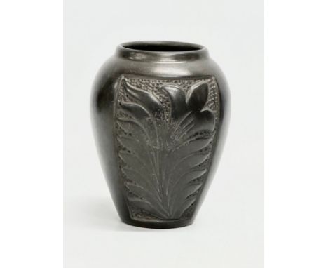 A black glazed ceramic pot by Marginea. 10x14cm 