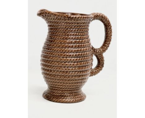 A large Mid 20th Century glazed rope design pitcher by Govancroft. 23x16x26cm. 