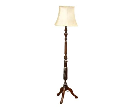 A mahogany standard lamp. 