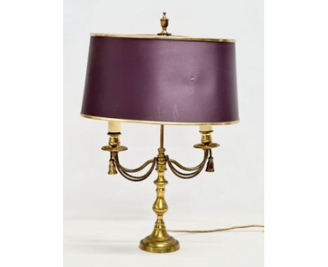 A brass table lamp with draped rope design. 38x28x58cm 