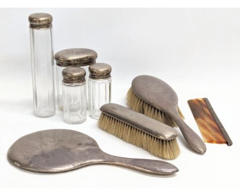 An early 20th century silver vanity set. Birmingham 1918-1919, and London. 