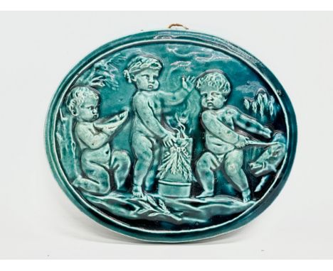 A Late 19th/Early 20th Century glazed stoneware wall plaque. Attributed to Burmantofts Faience. 19x16cm 