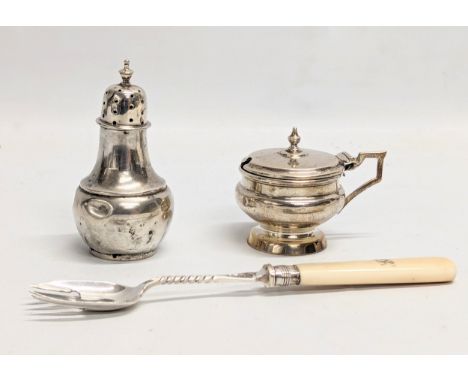 A quantity of early 20th century silver items including a silver mounted fork, etc. Sheffield, 1900. Birmingham, 1907 