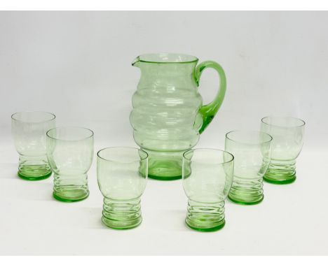 A 1930’s Art Deco Beehive drinks set. Pitcher 16x20cm. Glasses 7x10.5cm 