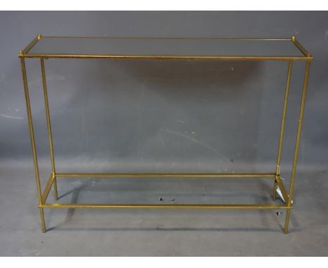 A contemporary rectangular gilt console table, with mirrored top, H.77 W.102 D.27cm 