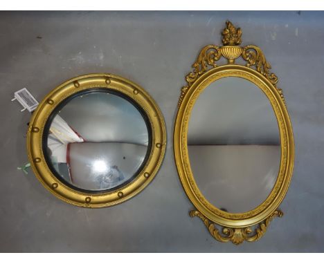 Two gilt mirrors, to include a Regency style circular mirror with concave glass, Diameter 45cm, and an oval gilt mirror with 