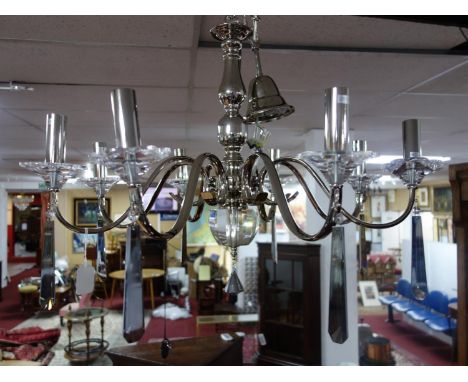 An 8 branch nickel plated chandelier by R V Astley, new with tags 