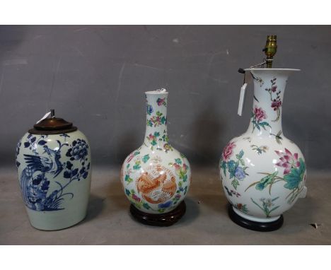 A 19th century Chinese blue and white temple jar converted to a lamp, together with a 20th century Chinese vase and lamp 