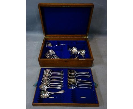 An Elkington canteen of silver plated cutlery,  incomplete, in oak case, to include dessert spoons, forks, sauce ladle and so