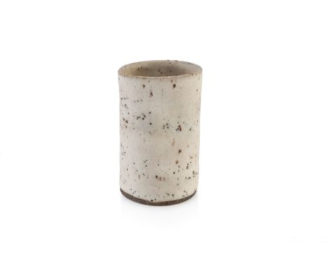 Lucie Rie (1902-1995) Small tapered vasewhite pitted glazeimpressed potter's seal mark and old exhibition label to the base8.